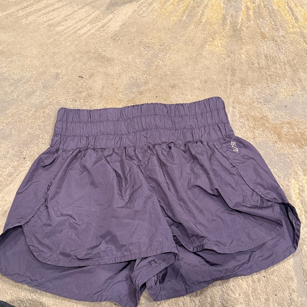 Free People movement Smocked High Waist Windbreaker Running Shorts size L purple